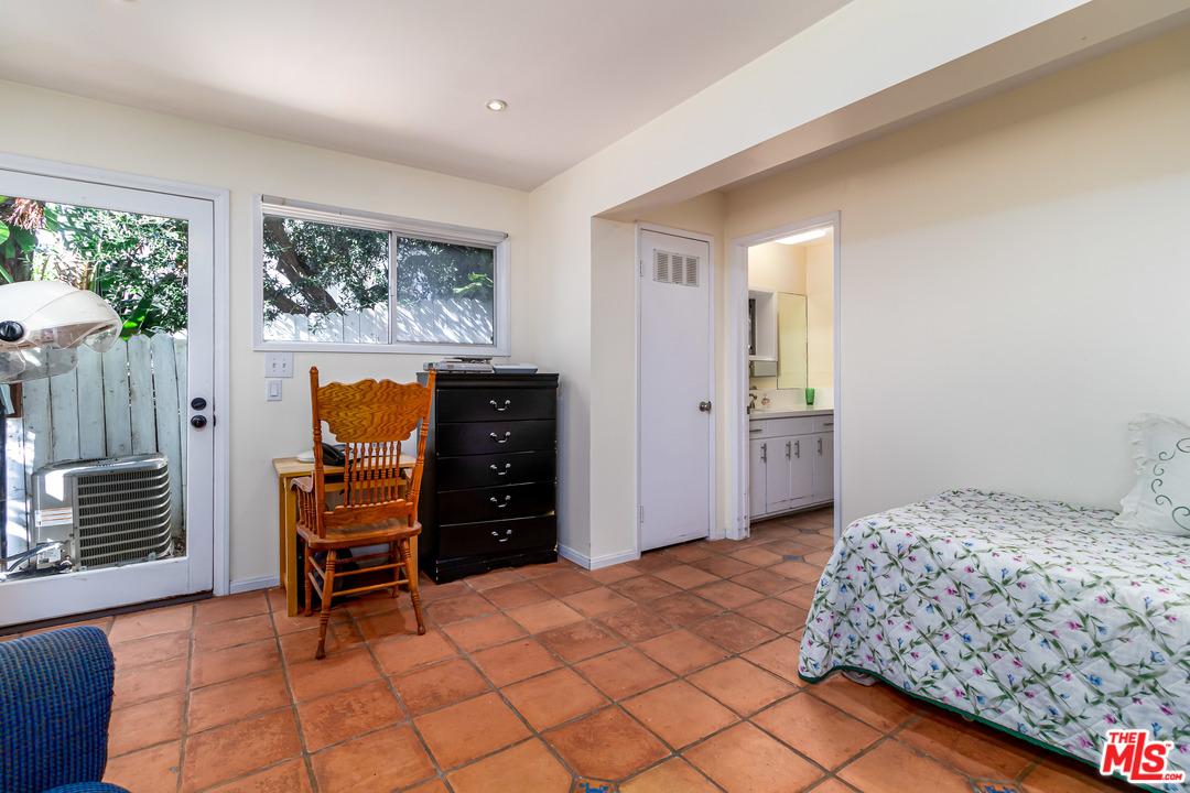 3938 Las Flores Canyon Road Malibu, CA 90265 - Photo 18 of 21 a bedroom with a bed and furniture