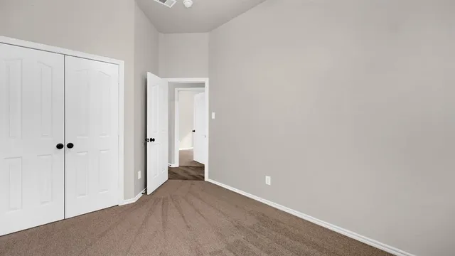 a view of a room with an empty space