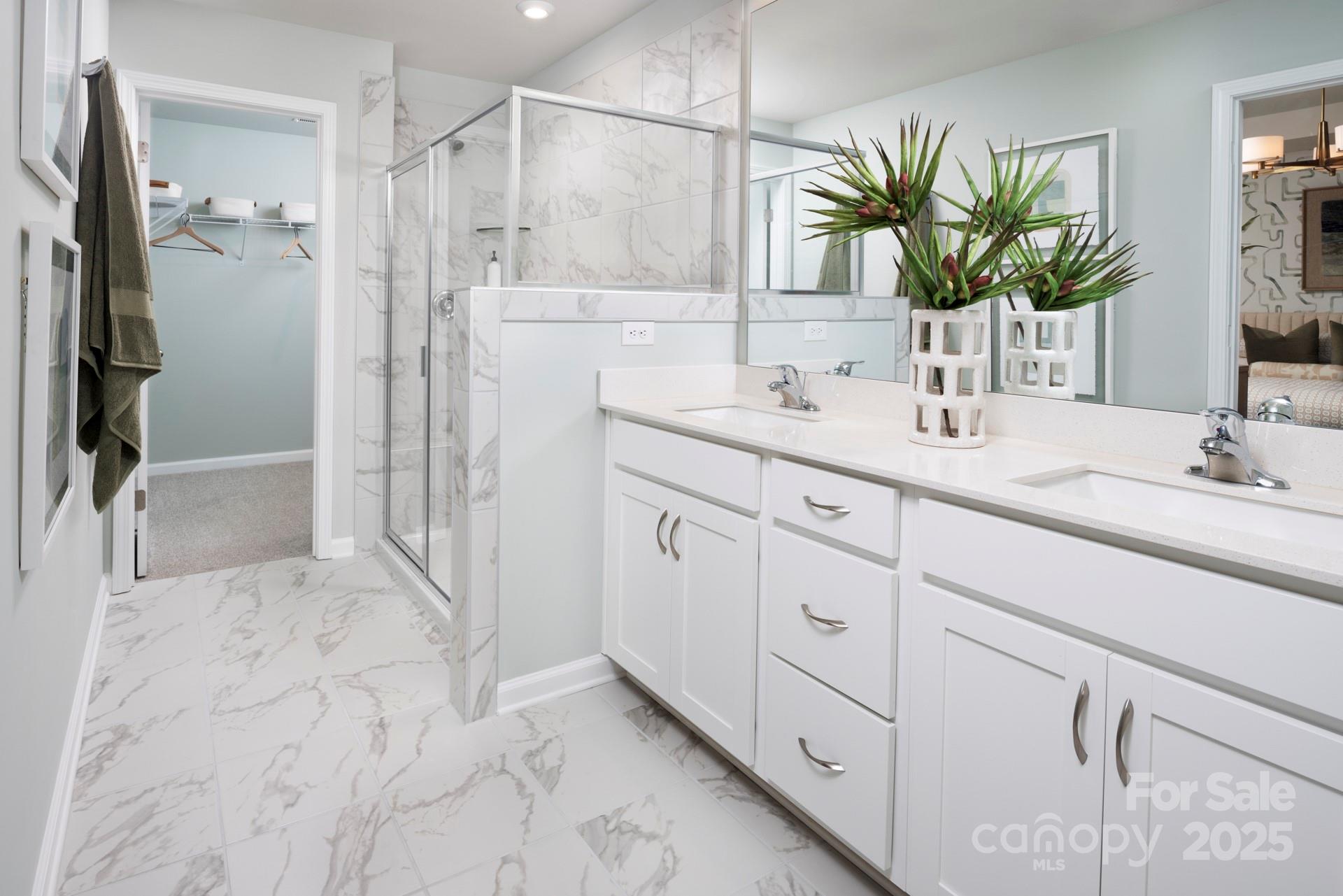 1118 Vibrant Road Charlotte, NC 28215 - Photo 7 of 14 a bathroom with a shower sink and mirror