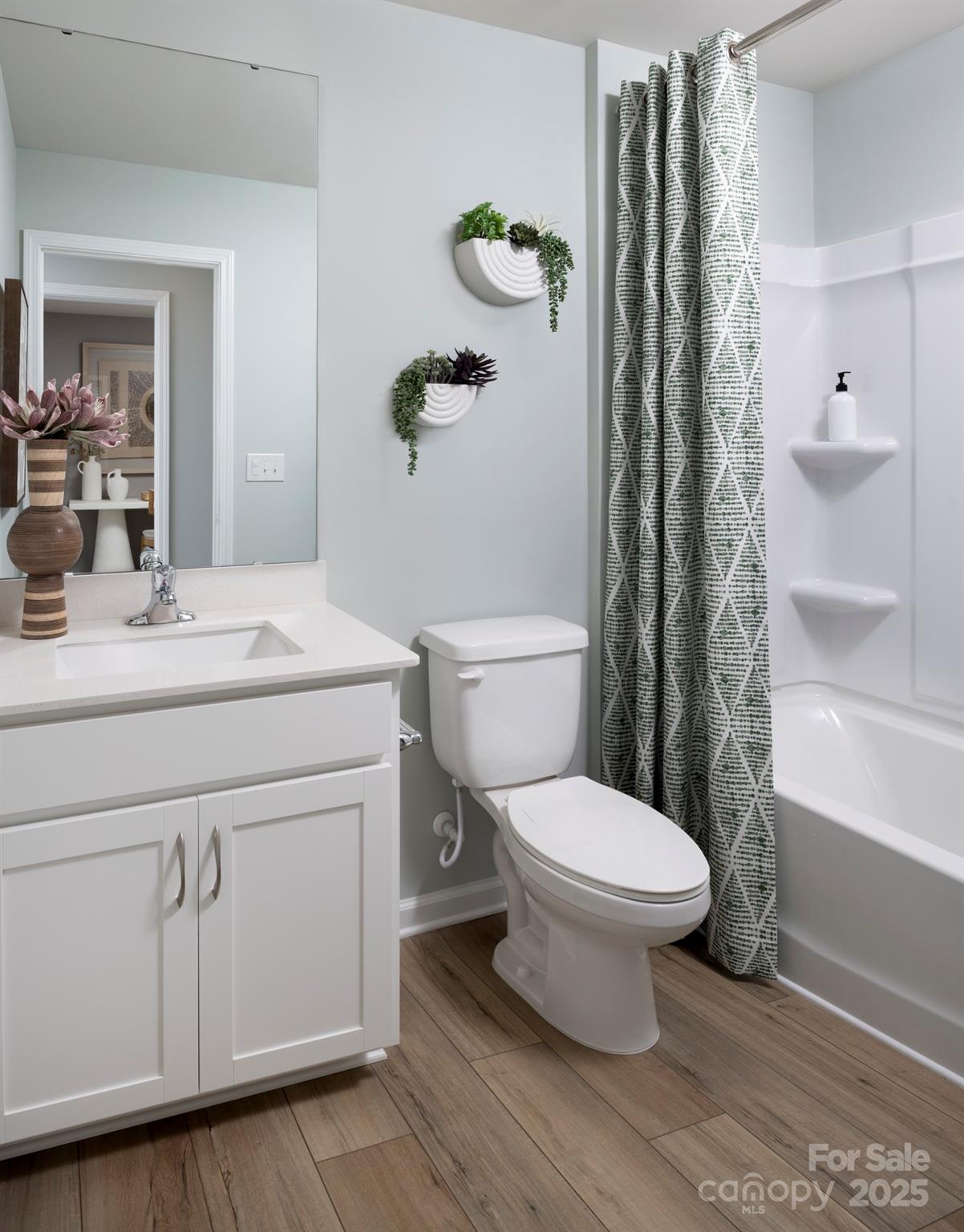 1118 Vibrant Road Charlotte, NC 28215 - Photo 10 of 14 a bathroom with a sink toilet and shower