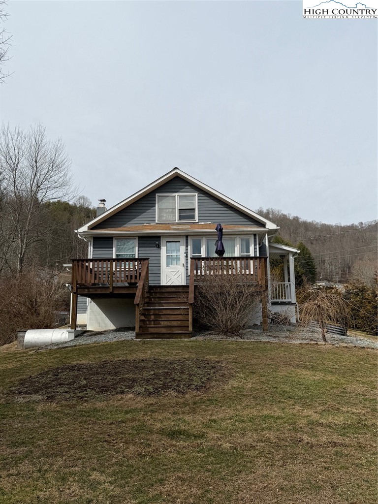 733 Clark Swift Road Vilas, NC 28692 - Photo 1 of 36 a view of a house with a yard