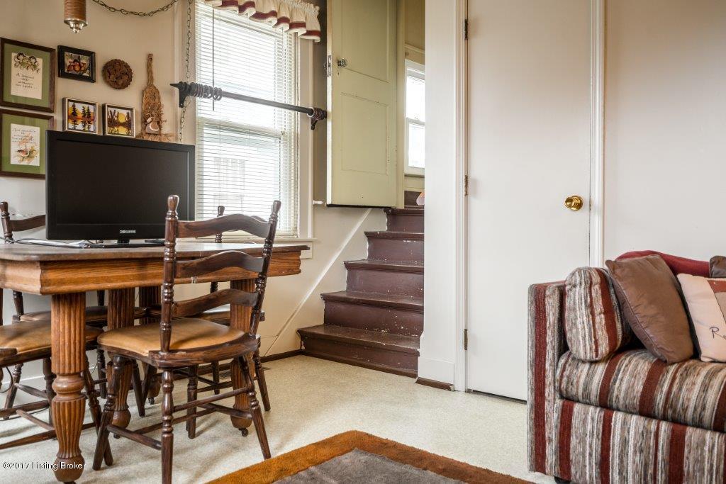 3836 Ormond Road Louisville, KY 40207 - Photo 21 of 43 The cozy hearth room area has turned stair access to the second floor