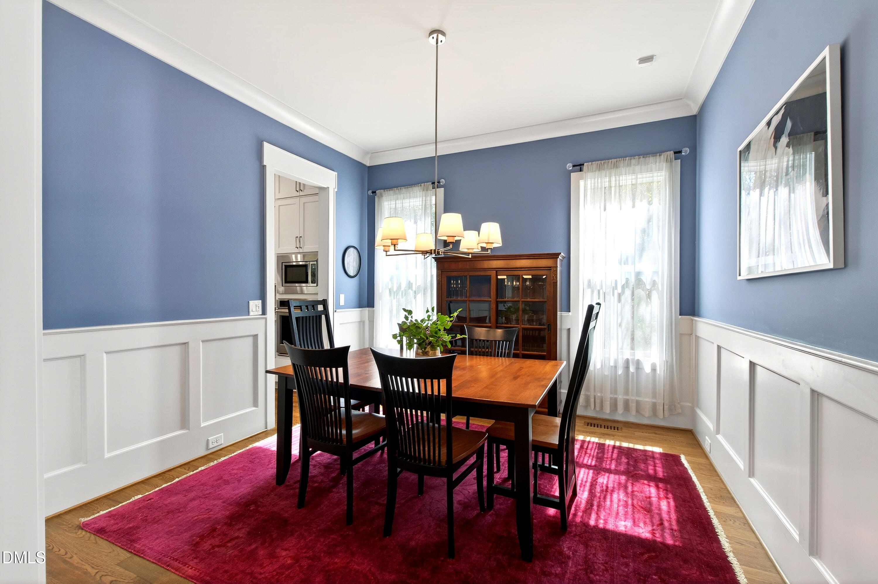 1116 Hymettus Court Raleigh, NC 27607 - Photo 4 of 69 a view of a dining room with furniture window and wooden floor