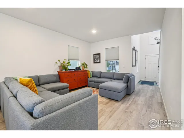 a living room with furniture and a couch