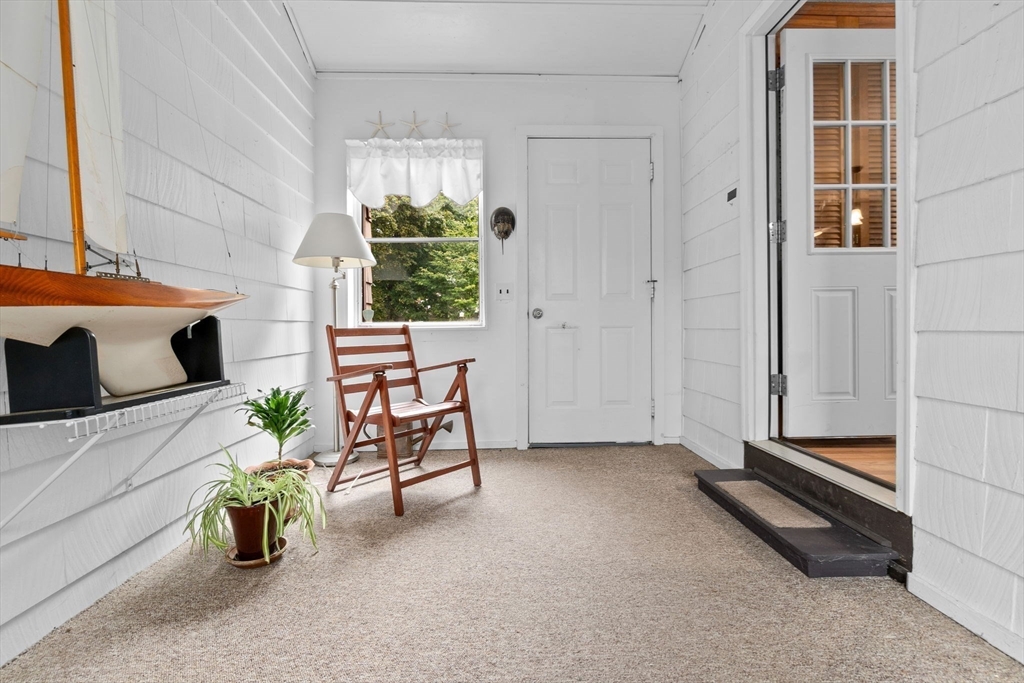 a room with furniture and a window