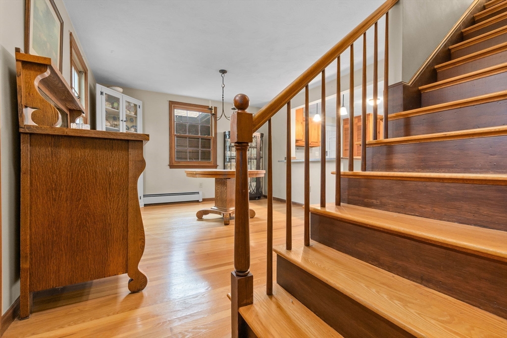 11 Heard Drive Ipswich, MA 01938 - Photo 16 of 41 a view of an entryway with wooden floor and door