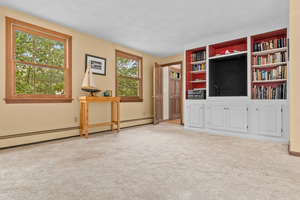 11 Heard Drive Ipswich, MA 01938 - Photo 20 of 41 an empty room with windows and cabinet