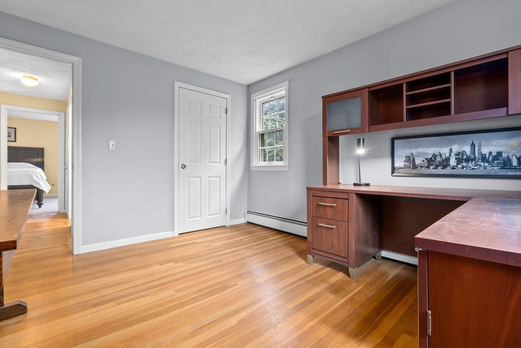 11 Heard Drive Ipswich, MA 01938 - Photo 24 of 41 a view of kitchen and empty room with wooden floor