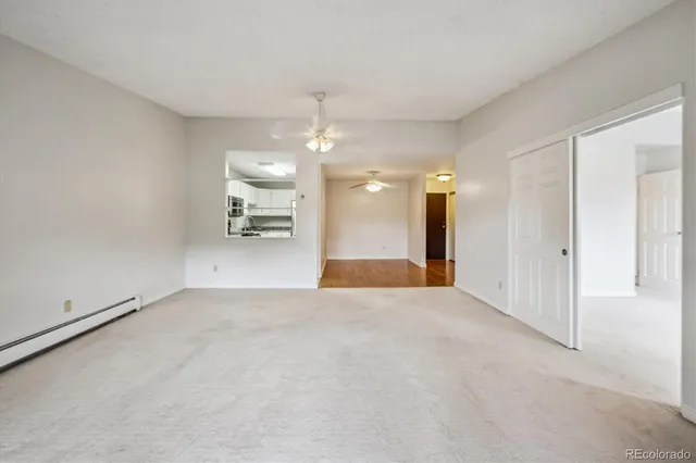 a view of a livingroom and a kitchen