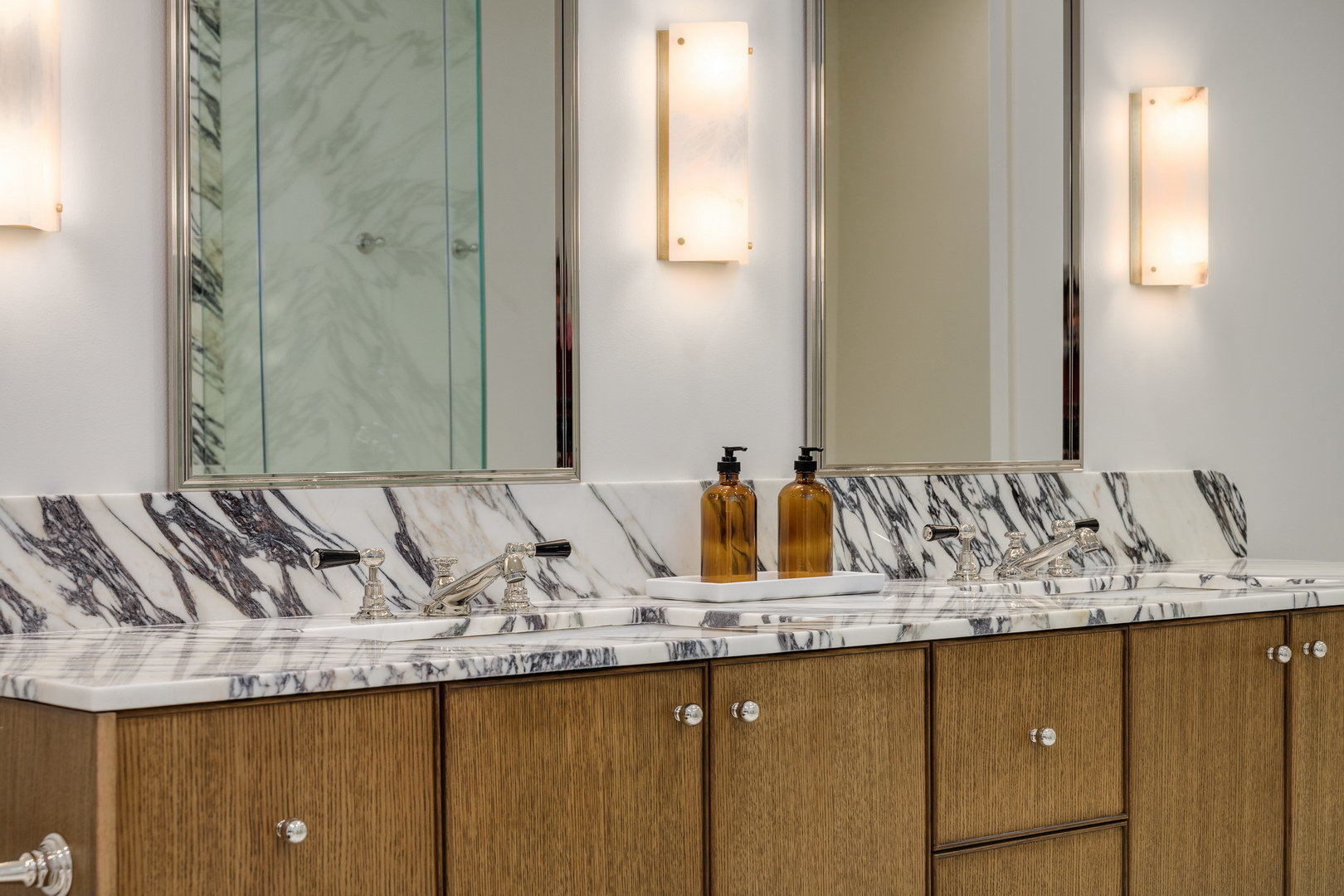 21 North May Street, Unit 802 Chicago, IL 60607 - Photo 21 of 26 a bathroom with a granite countertop sink and a mirror
