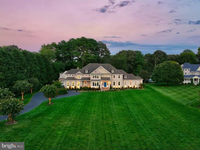 a living room with furniture a window and a fireplace