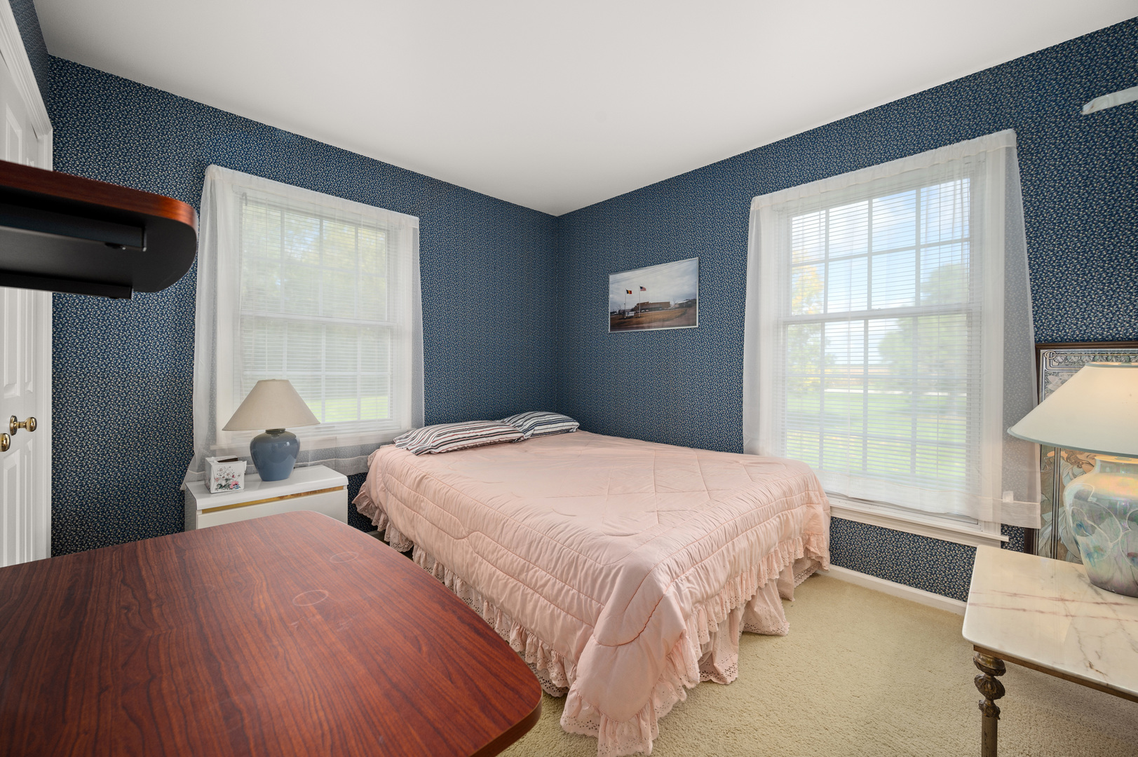 8510 Gurler Road DeKalb, IL 60115 - Photo 16 of 46 a bedroom with a bed and a large window