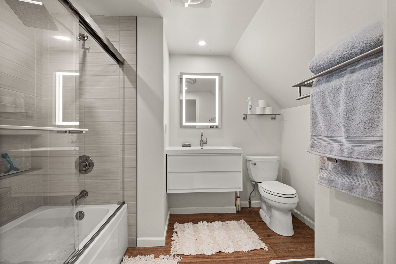 8510 Gurler Road DeKalb, IL 60115 - Photo 20 of 46 a bathroom with a sink toilet a shower and bathtub