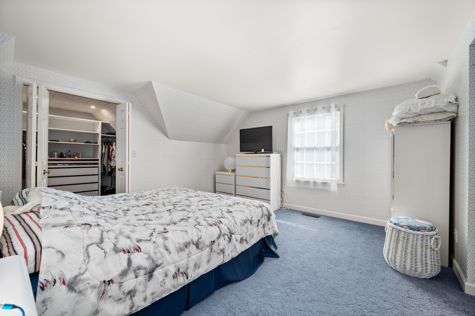 8510 Gurler Road DeKalb, IL 60115 - Photo 22 of 46 a bedroom with a bed and a window