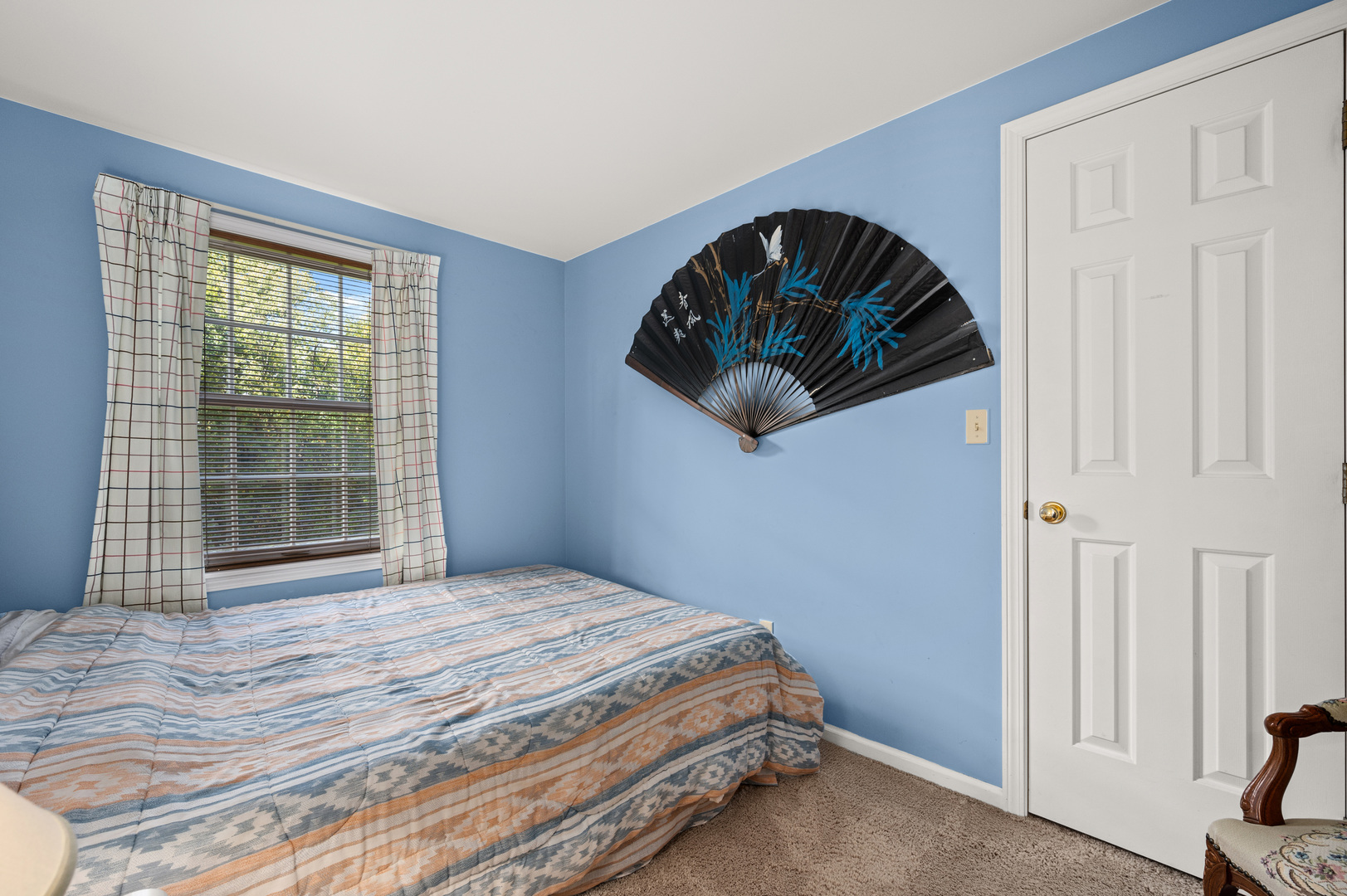 8510 Gurler Road DeKalb, IL 60115 - Photo 27 of 46 a bedroom with a bed and a window
