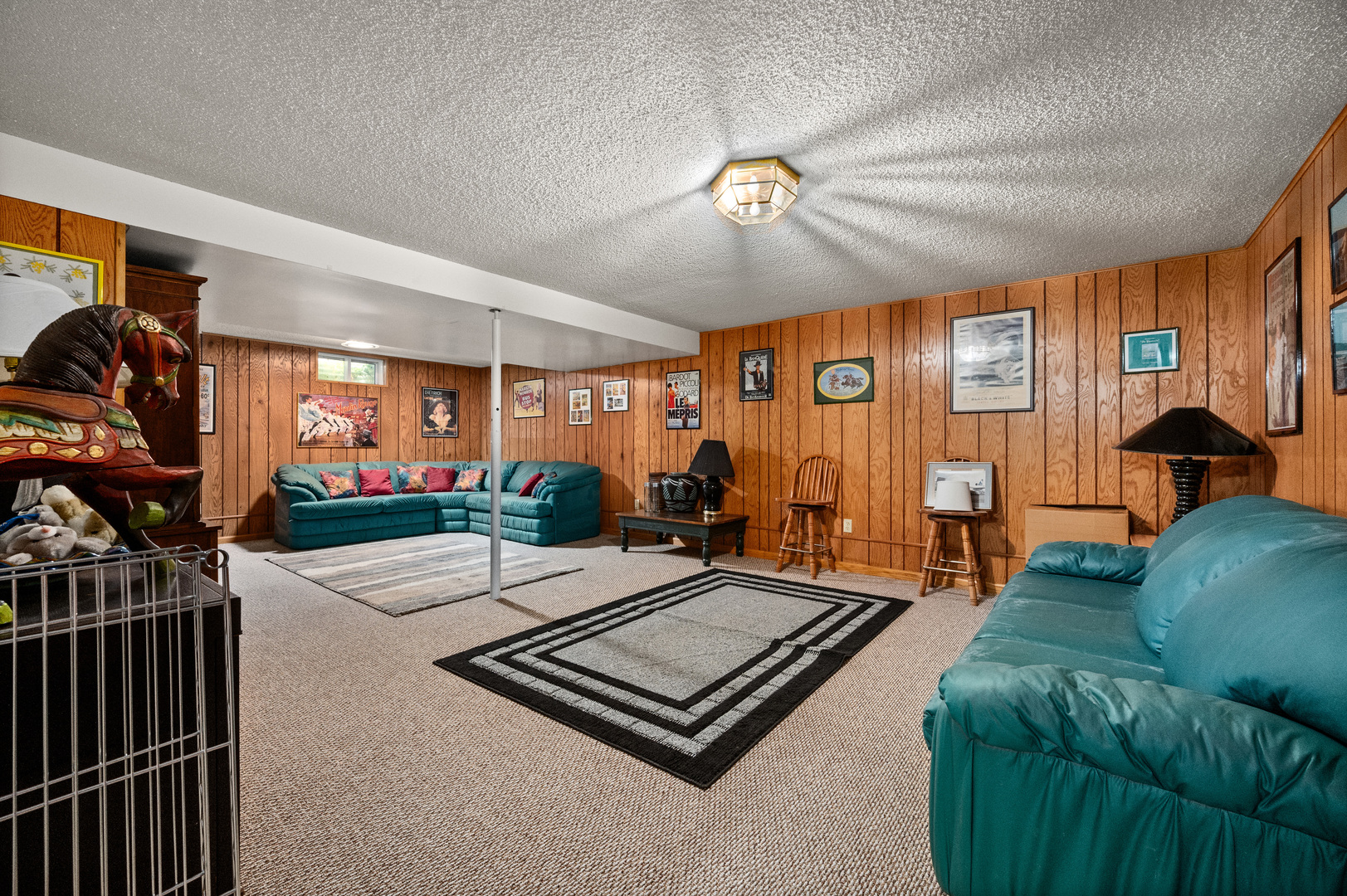 8510 Gurler Road DeKalb, IL 60115 - Photo 30 of 46 a living room with furniture flat screen tv and windows
