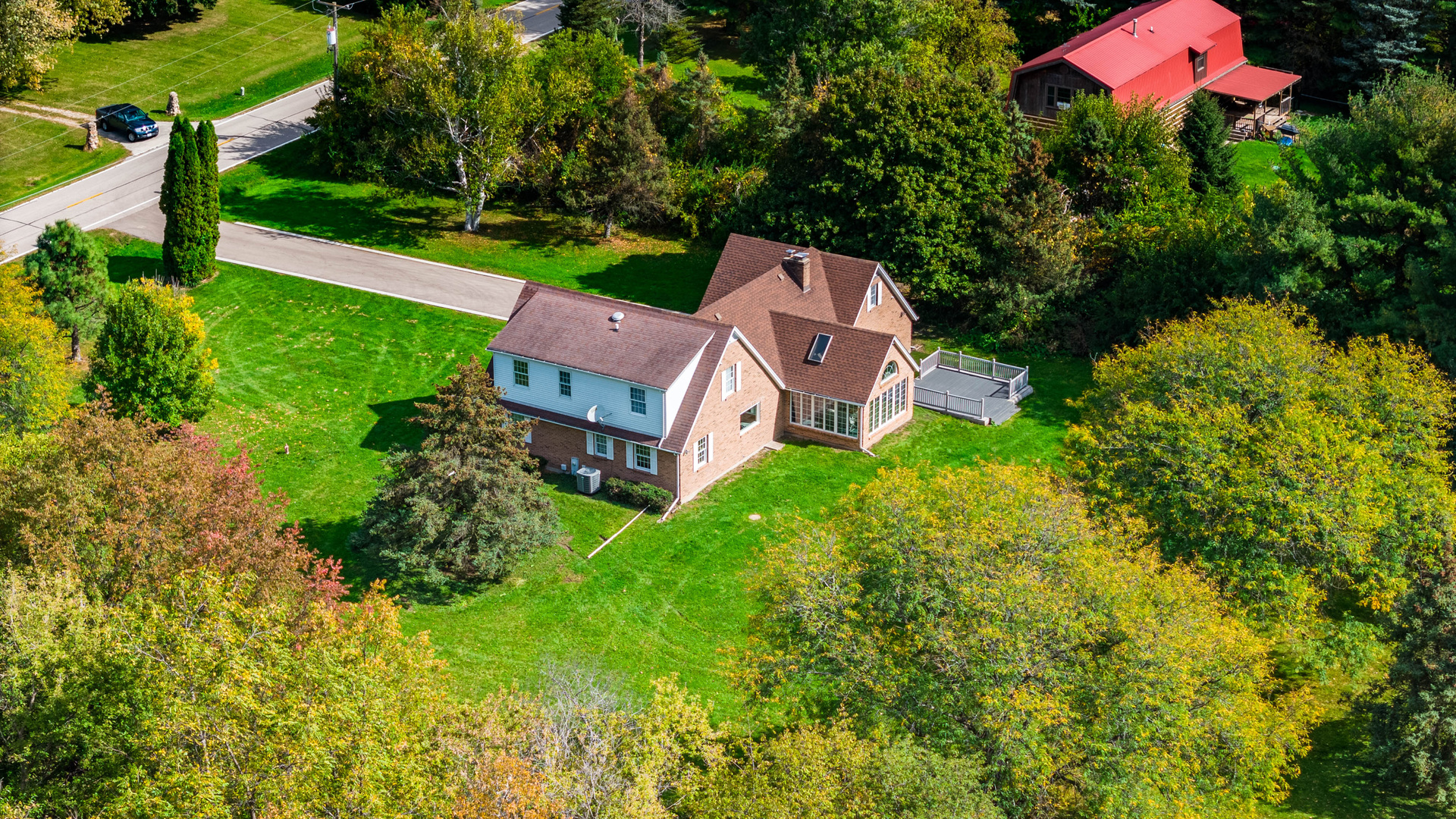 8510 Gurler Road DeKalb, IL 60115 - Photo 38 of 46 an aerial view of a house with yard