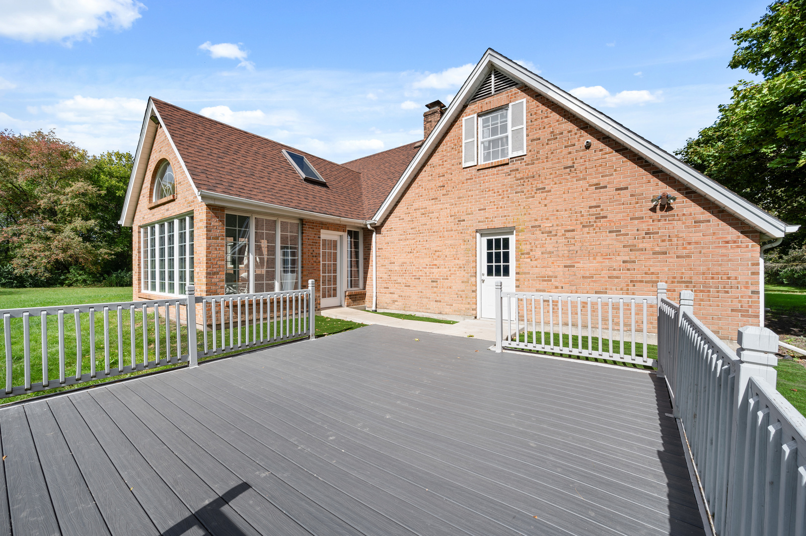 8510 Gurler Road DeKalb, IL 60115 - Photo 41 of 46 a view of a house with wooden deck