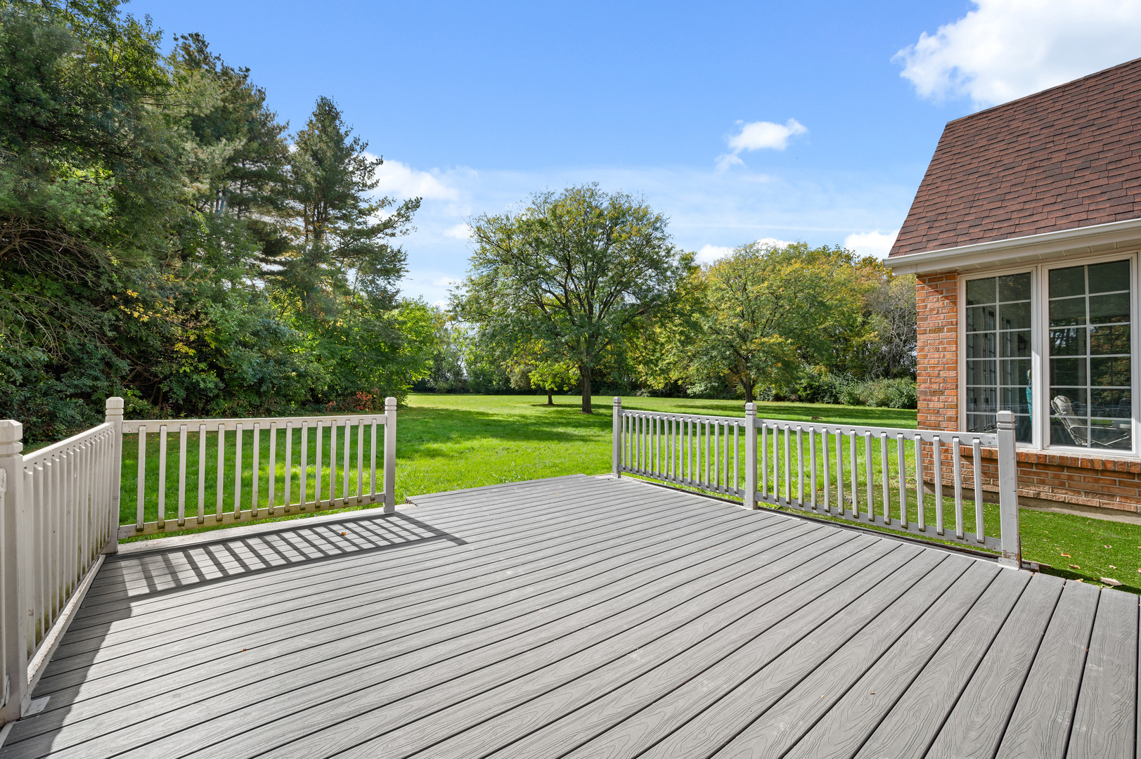 8510 Gurler Road DeKalb, IL 60115 - Photo 42 of 46 a view of a deck with a yard