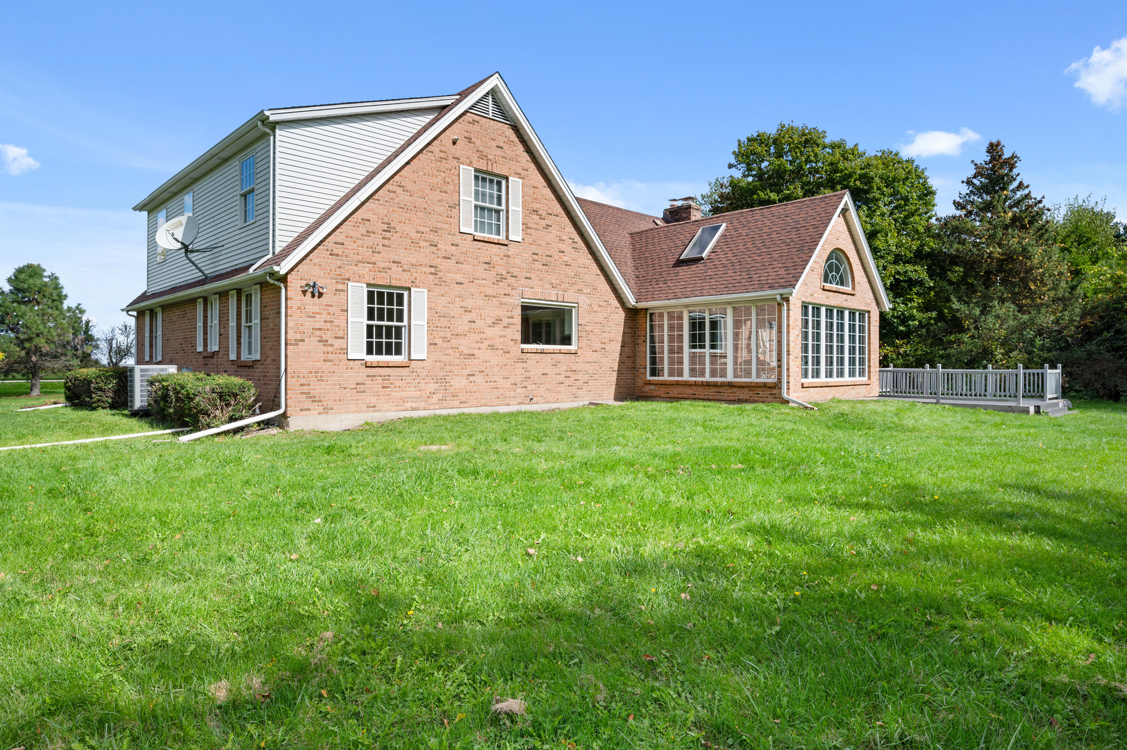 8510 Gurler Road DeKalb, IL 60115 - Photo 43 of 46 a front view of house with yard and green space
