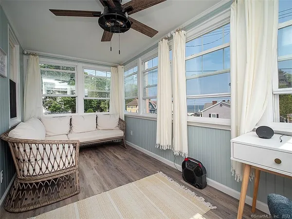 a living room with furniture and a window
