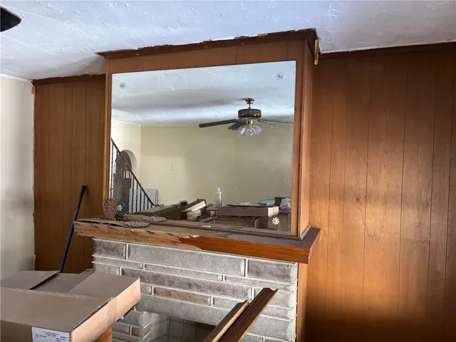 a room with a table and a mirror