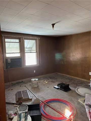 a room with furniture and window