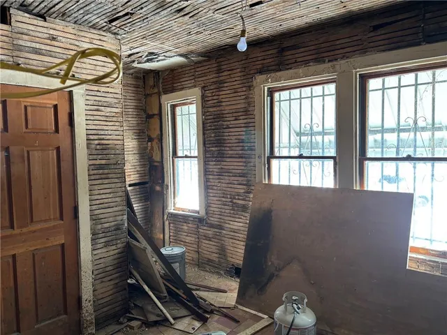 a view of a house with a large window