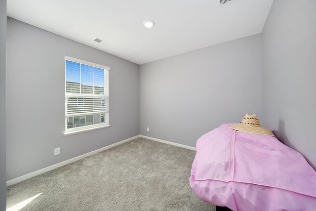 1004 Atterberg Road South Elgin, IL 60177 - Photo 14 of 22 a bedroom with a bed and a window