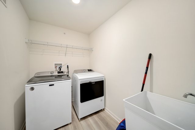 1004 Atterberg Road South Elgin, IL 60177 - Photo 20 of 22 a utility room with dryer and washer
