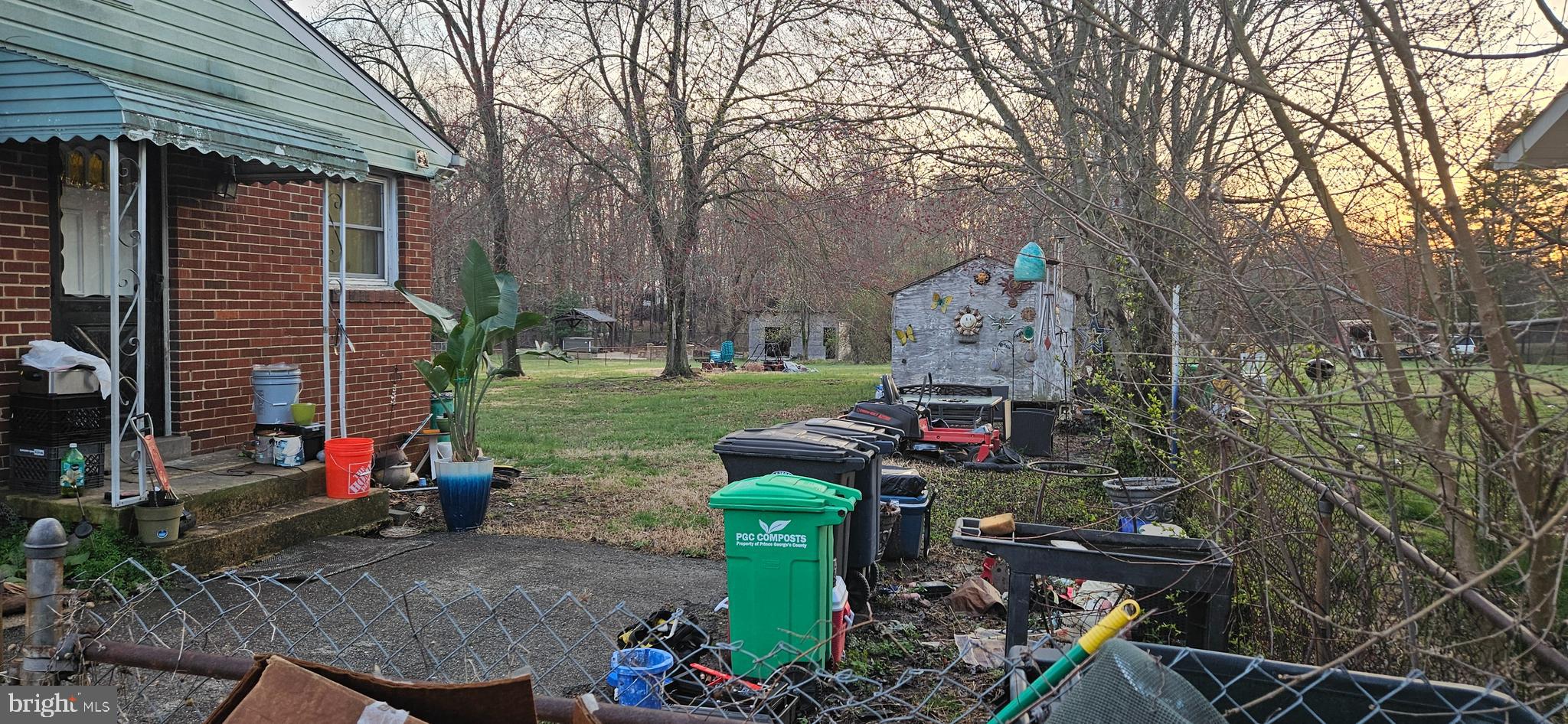 9011 Spring Acres Road Clinton, MD 20735 - Photo 2 of 11 a view of a house with a backyard and a trees
