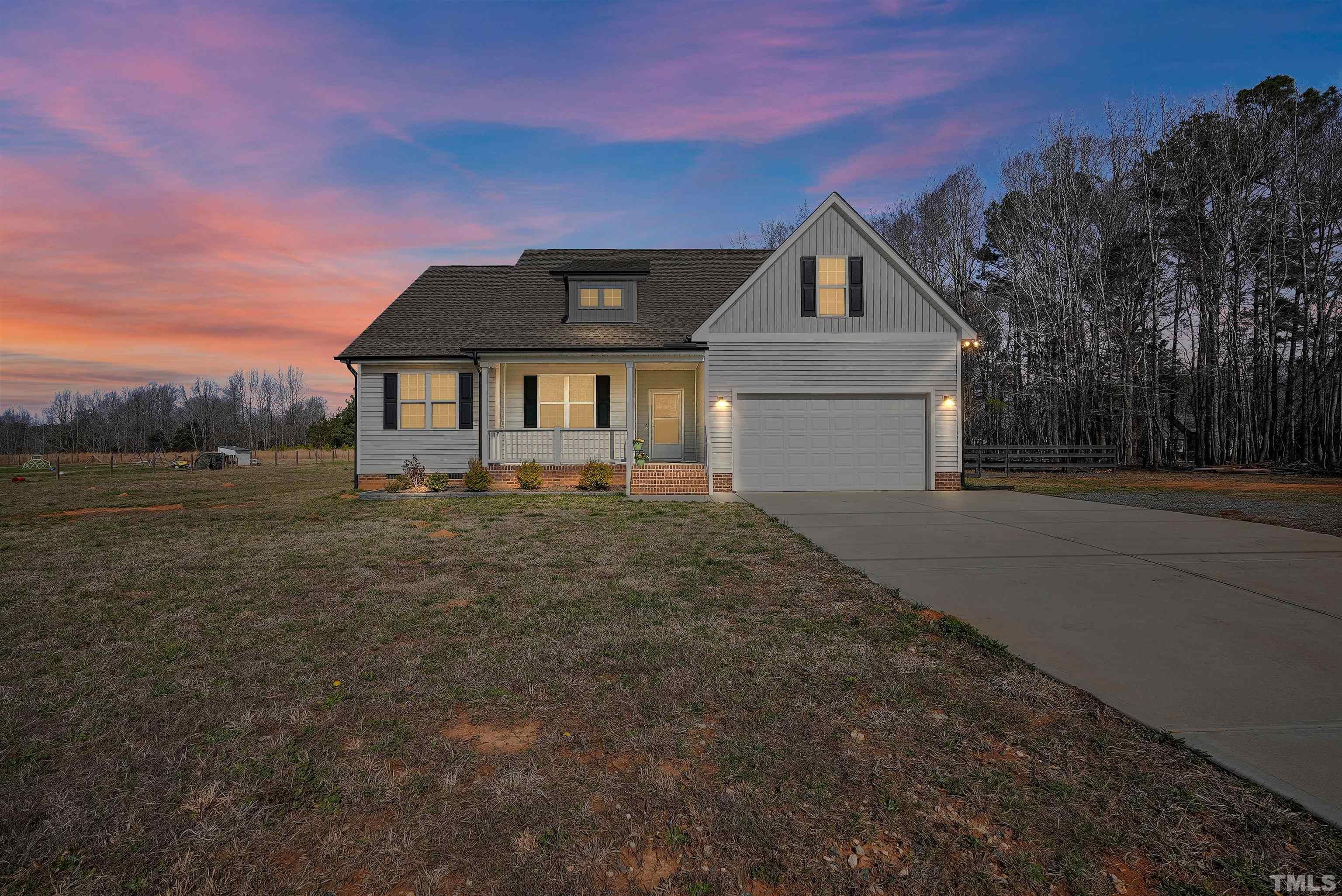 4085 Old 75 Highway Stem, NC 27581 - Photo 2 of 36 front view of house with a yard