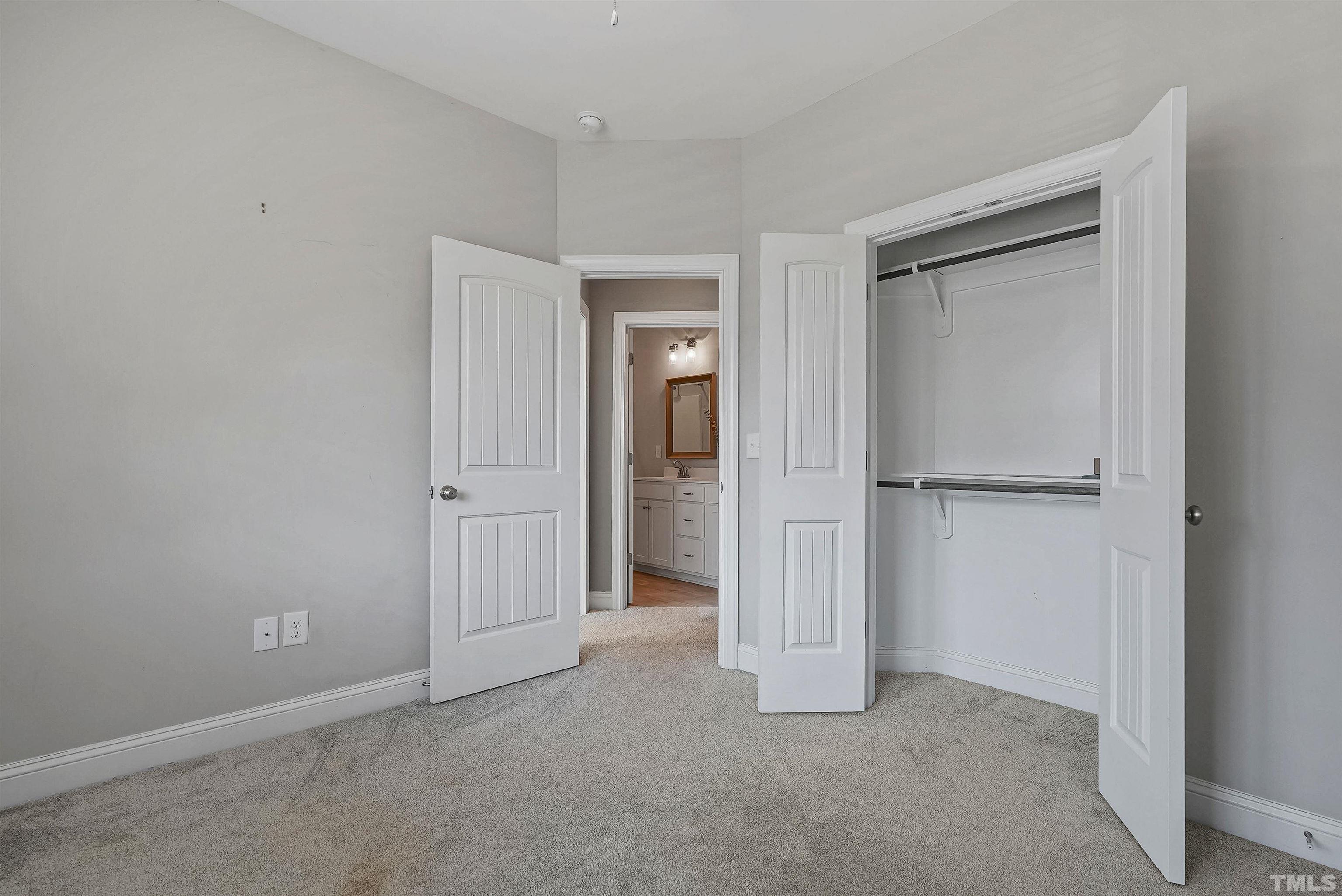 4085 Old 75 Highway Stem, NC 27581 - Photo 22 of 36 a view of an empty room with closet and a bathroom