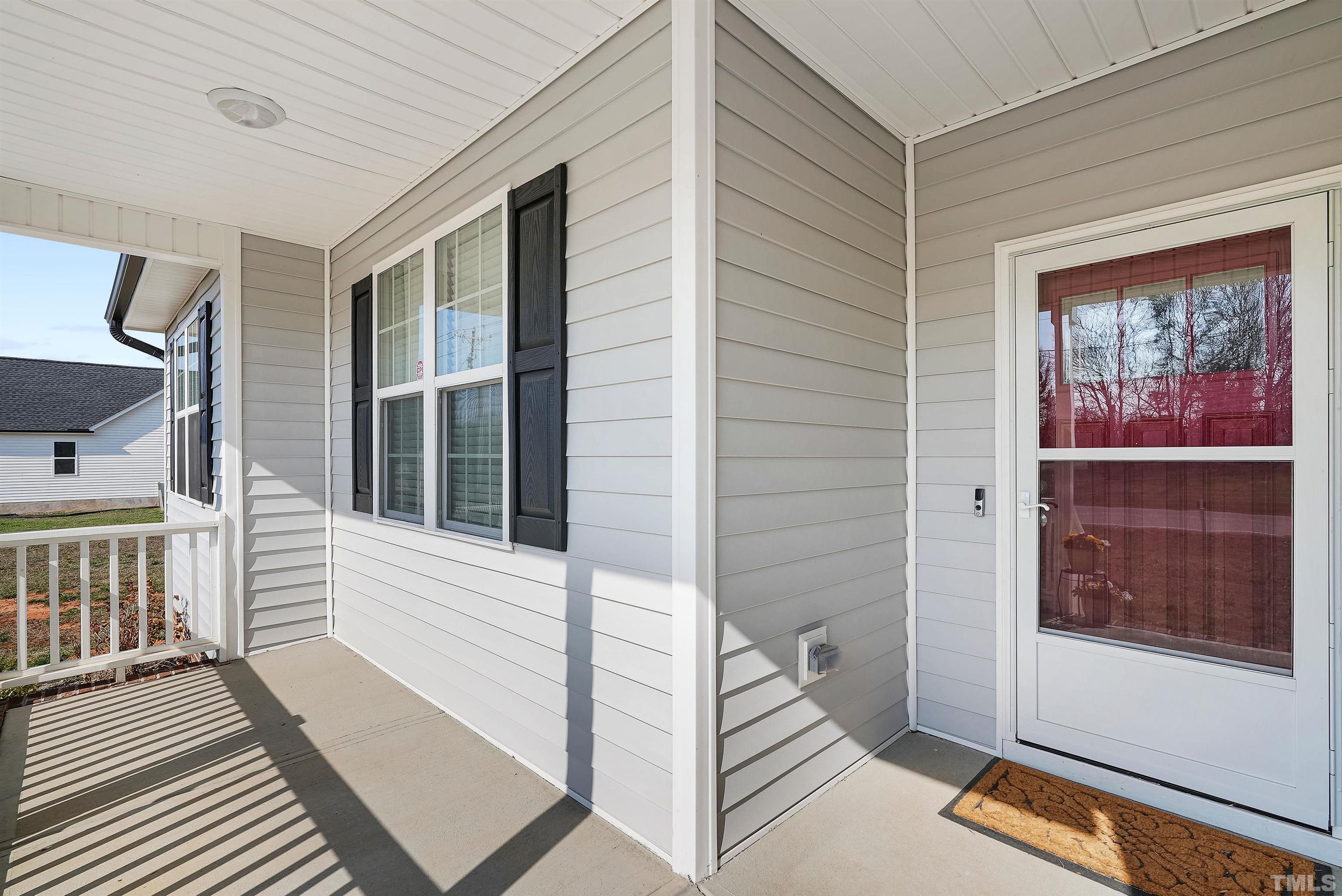 4085 Old 75 Highway Stem, NC 27581 - Photo 5 of 36 a view of a house with a porch