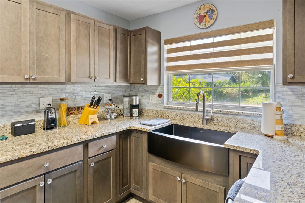 965 North Appalachian Terrace Crystal River, FL 34429 - Photo 15 of 65 a kitchen with a sink cabinets and window