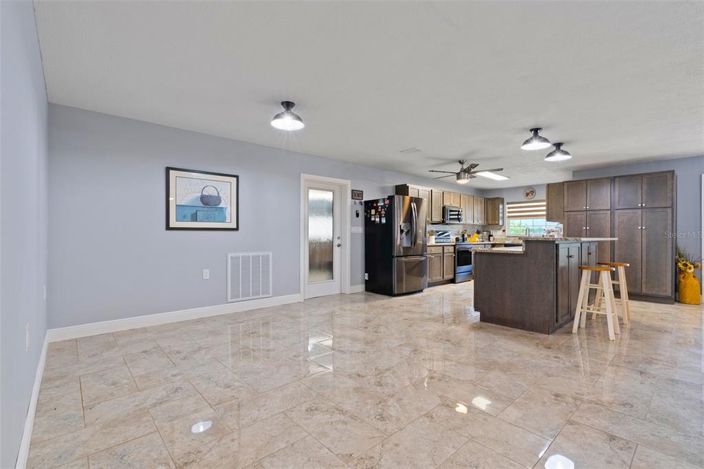 965 North Appalachian Terrace Crystal River, FL 34429 - Photo 19 of 65 a view of a livingroom with furniture and an empty room