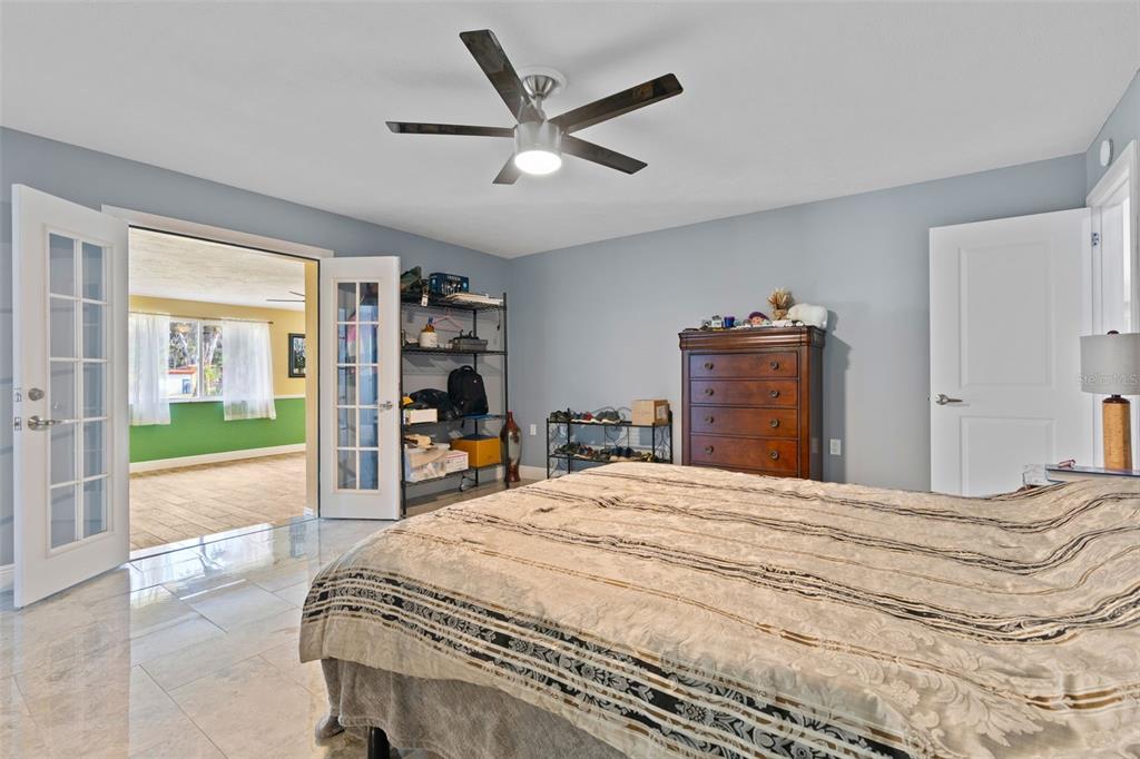 965 North Appalachian Terrace Crystal River, FL 34429 - Photo 27 of 65 a bed room with a bed and a television