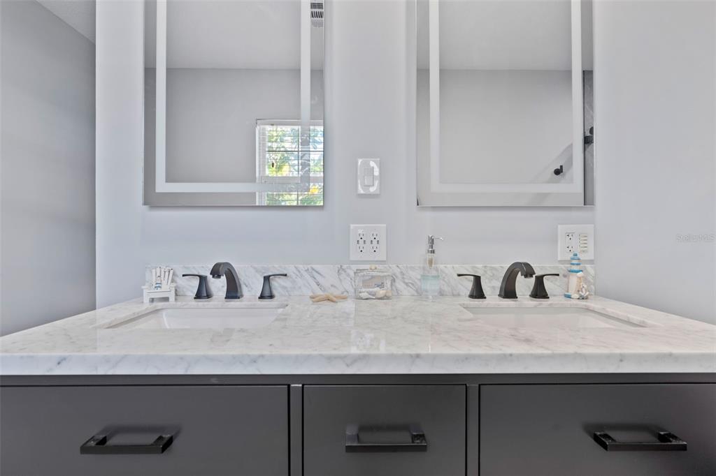 965 North Appalachian Terrace Crystal River, FL 34429 - Photo 31 of 65 a bathroom with a granite countertop white and a sink