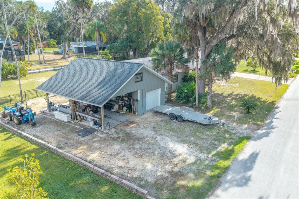 965 North Appalachian Terrace Crystal River, FL 34429 - Photo 41 of 65 a view of a house with backyard porch and sitting area