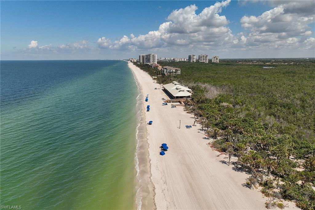 6897 Grenadier Boulevard, Unit 207 Naples, FL 34108 - Photo 4 of 27 a view of a lake