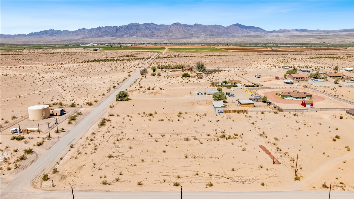 4495 Cavalry Road Fort Mohave, AZ 86426 - Photo 7 of 11 Aerial view of sparsely populated area featuring a mountainous background