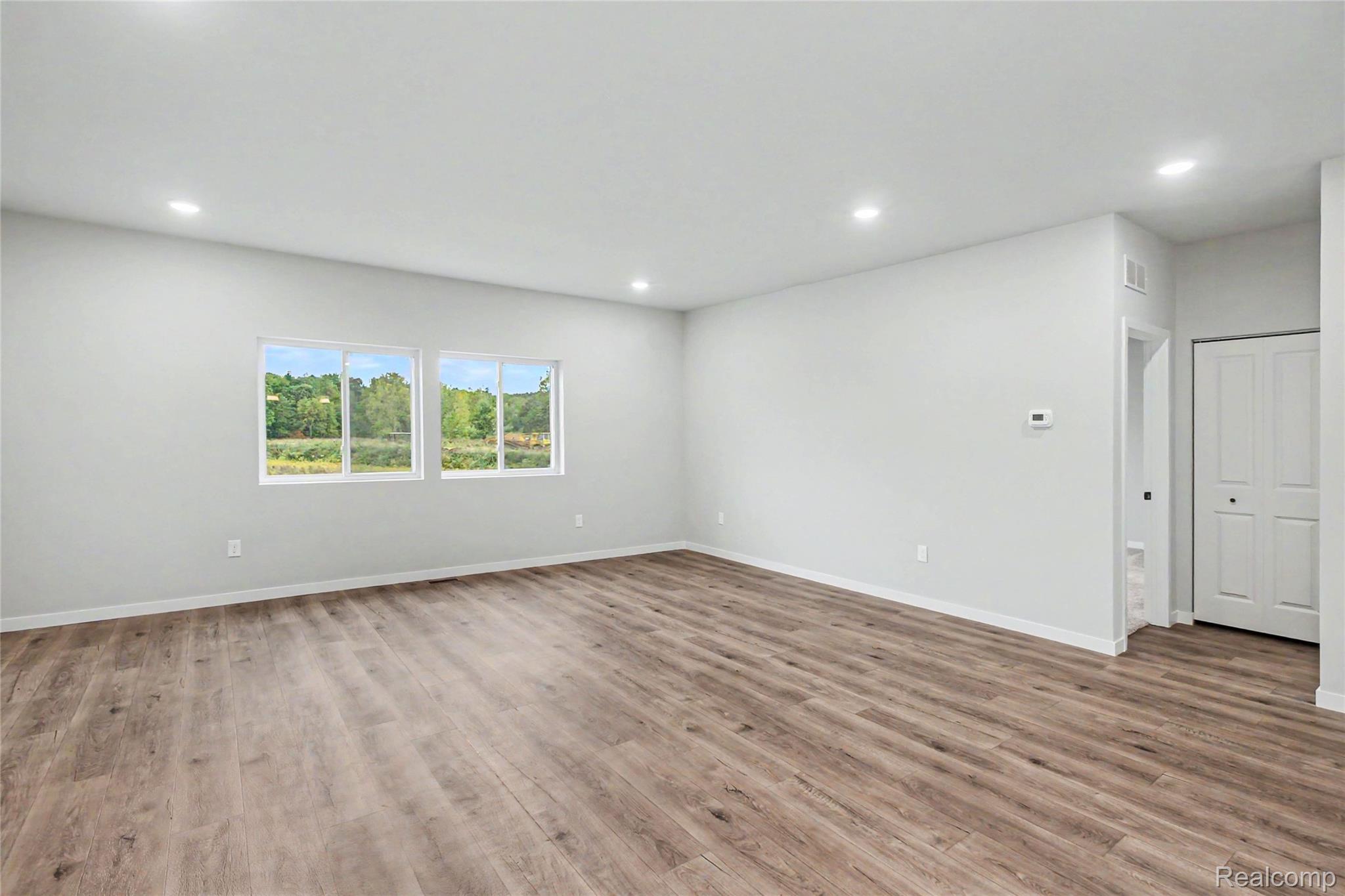 1210 Lockes Street Howell, MI 48843 - Photo 8 of 37 Upper level features an abundance of natural lighting