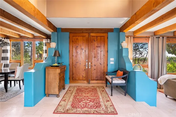 a kitchen with stainless steel appliances granite countertop a sink and a refrigerator