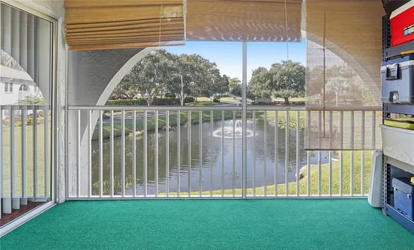 a front view of a house with a garden and plants