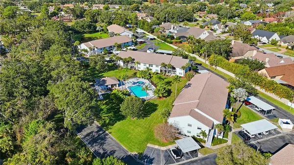 an aerial view of a house with a garden