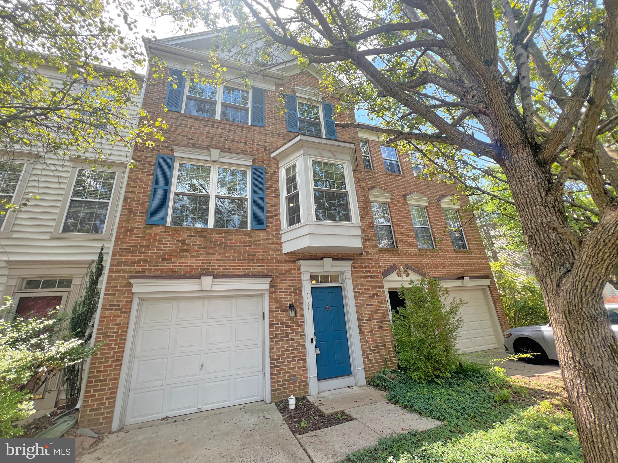 1191 Cypress Tree Place Herndon, VA 20170 - Photo 1 of 18 front view of a building