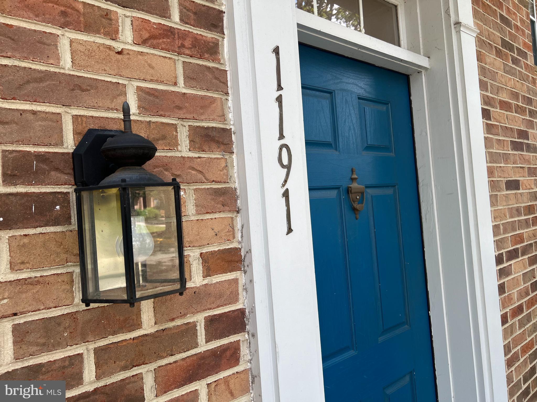 1191 Cypress Tree Place Herndon, VA 20170 - Photo 3 of 18 a view of a door and a window