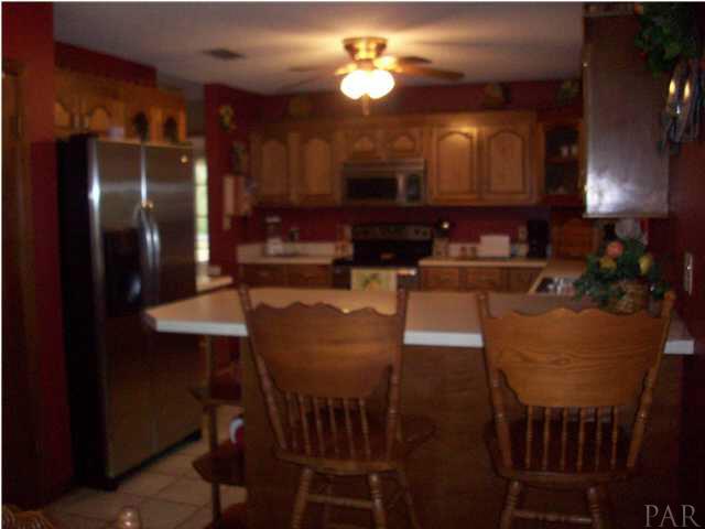 2163 Huxford Road Atmore, AL 36502 - Photo 6 of 11 kitchen with breakfast bar