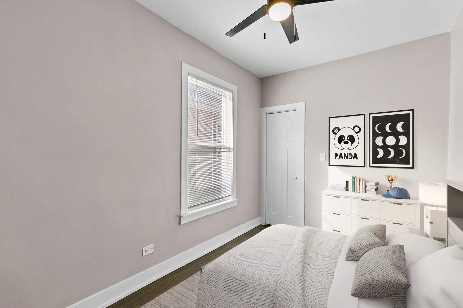 7501 South Morgan Street Chicago, IL 60620 - Photo 12 of 24 a bedroom with a bed and a window