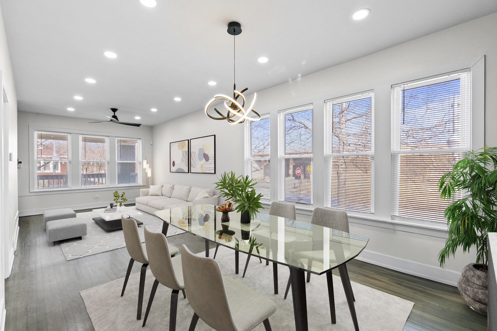 7501 South Morgan Street Chicago, IL 60620 - Photo 2 of 24 a view of a dining room with furniture window and wooden floor